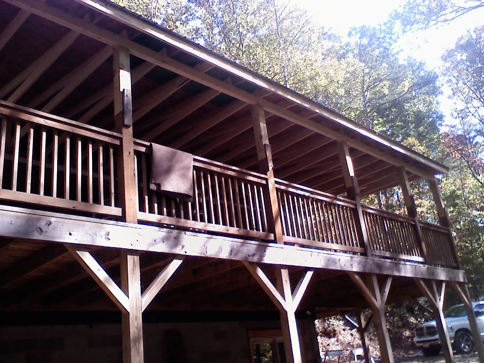 Timber framing under a new elevated porch and deck — Roof Leak Repair in Severna Park by Roofing Brothers